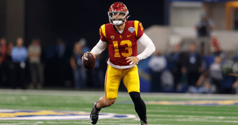 Caleb Williams #13 of the USC Trojans looks to throw against the Tulane Green Wave in the first half of the Goodyear Cotton Bowl Classic on January 2, 2023 at AT&T Stadium in Arlington, Texas. (Photo by Ron Jenkins/Getty Images)