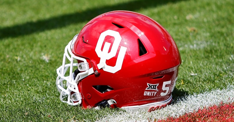 A football helmet is displayed after a news conference announcing News  Photo - Getty Images