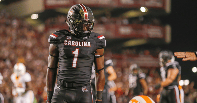 South Carolina receiver Deebo Samuel stands over a Tennessee player after making a catch