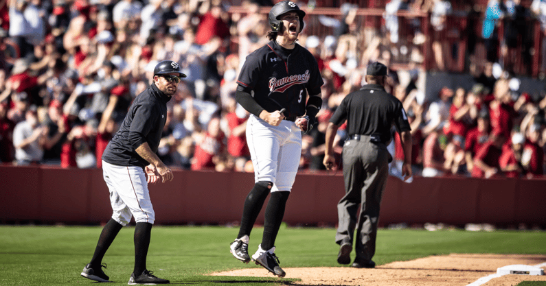 South Carolina third baseman Talmadge LeCroy celebrates after hitting a home run against Clemson