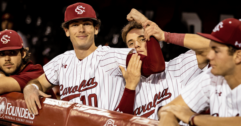 South Carolina outfielders Dylan Brewer (left) and Evan Stone (right) flex before a game against Bethune-Cookman