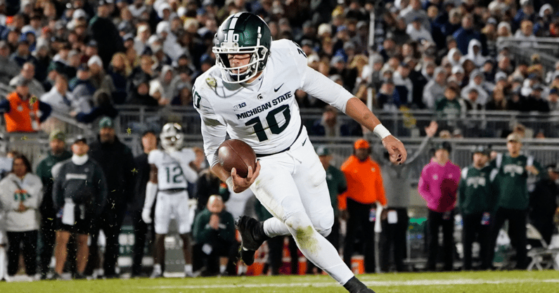 Payton Thorne runs the ball against Penn State
