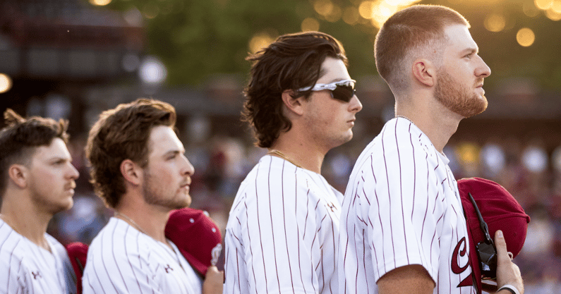 South Carolina infielders Braylen Wimmer and Gavin Casas stand at attention for the national anthem