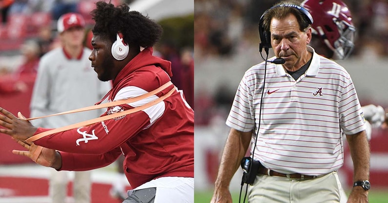Alabama OL Tyler Booker and HC Nick Saban