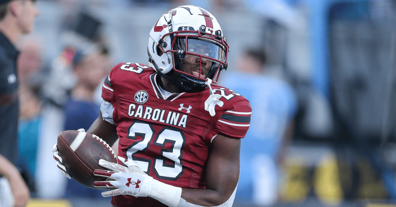 South Carolina running back Djay Braswell warms up against North Carolina