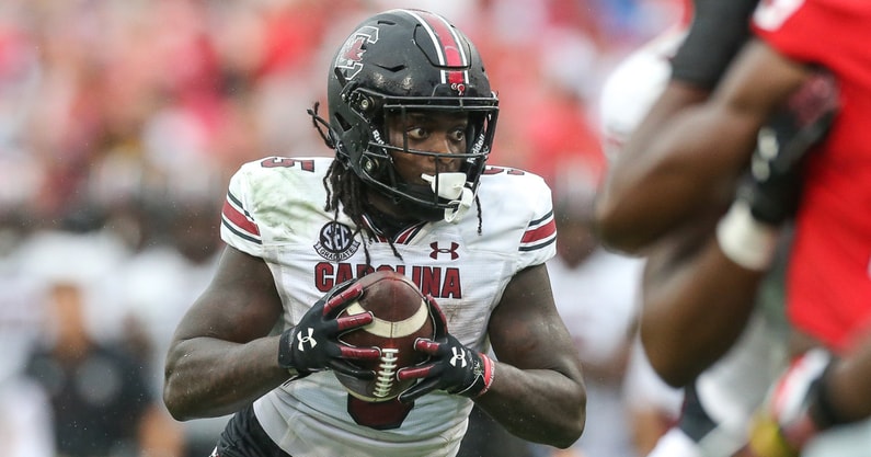 South Carolina running back Dakereon Joyner rushes ahead for a touchdown against Georgia