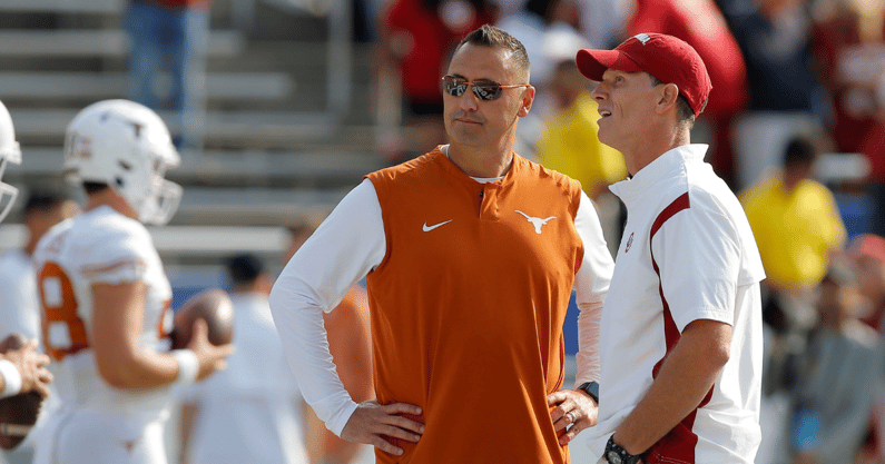 Texas and Oklahoma head coaches meet before a game
