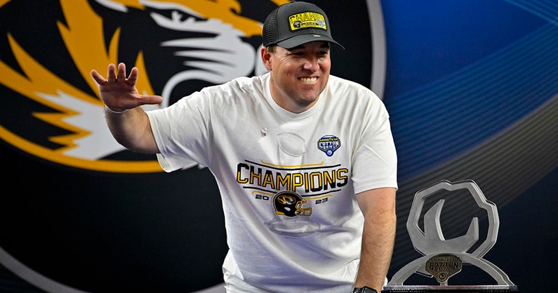 Missouri HC Eli Drinkwitz celebrates after the Cotton Bowl