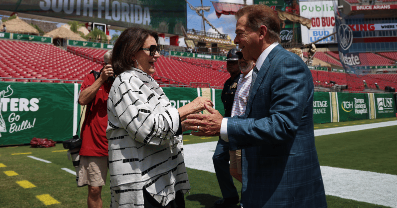 Alabama coach Nick Saban and Miss Terry