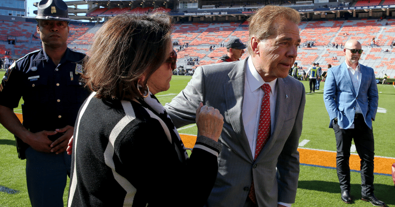 Alabama coach Nick Saban and Miss Terry