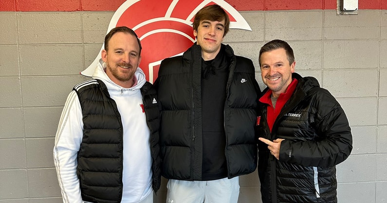 TE Reiman Zebert with the Nebraska coaches
