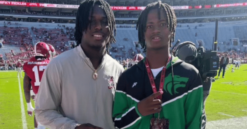 JaBarrius Garror with Alabama Crimson Tide linebacker Deontae Lawson.