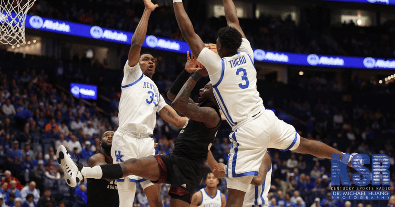 Adou Thiero Ugonna Onyenso attempt to block a Texas AM shot for Kentucky