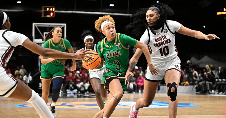 Notre Dame Fighting Irish guard Hannah Hidalgo (3) drives against South Carolina Gamecocks center Kamilla Cardoso (10) in a women's college basketball game at Halles Georges Arena.