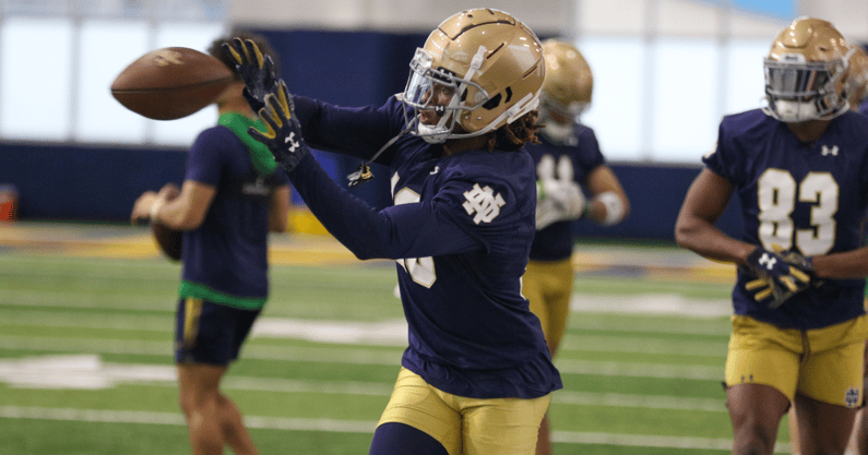 notre dame wide receiver kris mitchell catches a pass during spring practice