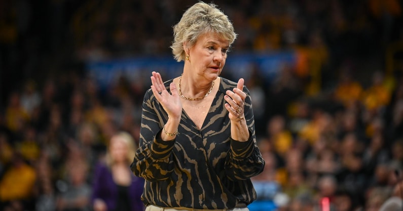 Iowa head coach Lisa Bluder coaches during their matchup against Holy Cross. (Photo by Dennis Scheidt)