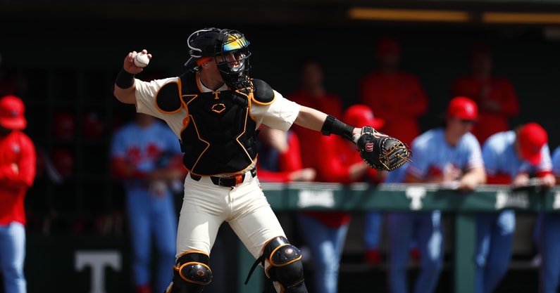 Cannon Peebles throws the ball back to the pitcher during Tennessee's 15-4 win over Ole Miss on March 24. Credit: UT Athletics