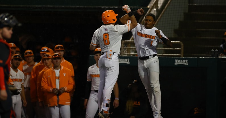 Christian Moore and Dylan Dreiling of Tennessee baseball celebrating a big inning. Credit: UT Athletics
