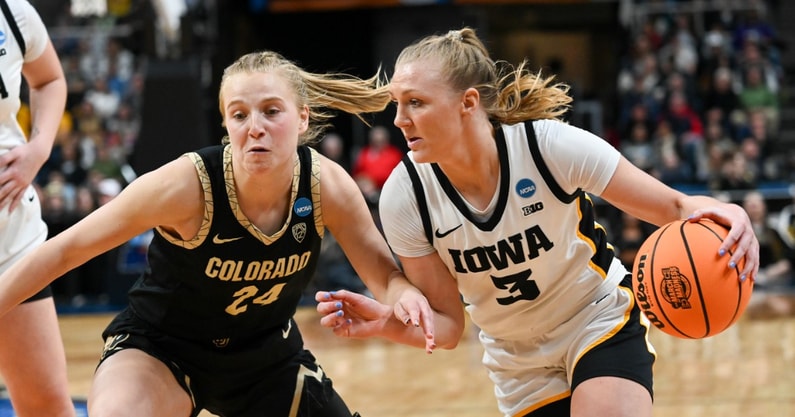 Syd Affolter drives to the basket against Colorado. (Photo by Dennis Scheidt)