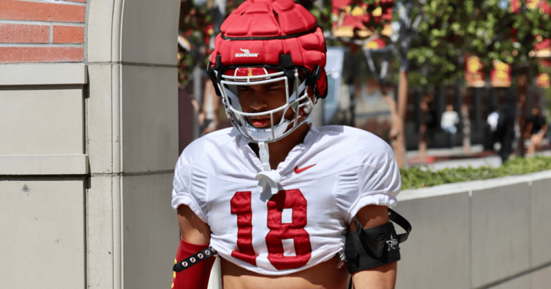 USC linebacker Eric Gentry walks out to a spring ball practice with the Trojans