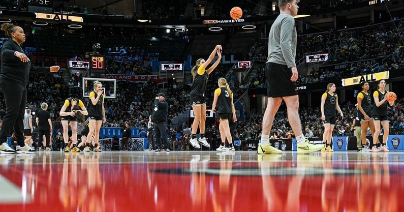 The Hawkeyes practice at Rocket Mortgage FieldHouse on Saturday. (Photo by Dennis Scheidt)
