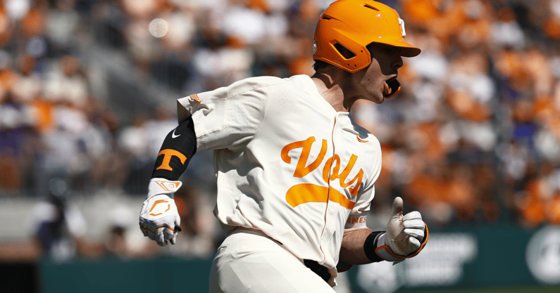 Tennessee catcher Cal Stark celebrates while rounding the bases on a Blake Burke home run. Credit: Tennessee Athletics
