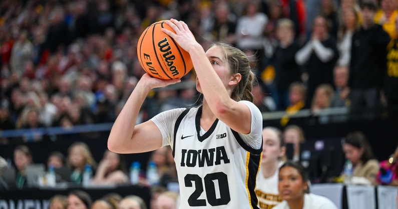Kate Martin attempts a three-pointer against Nebraska at the Big Ten Tournament. (Photo by Dennis Scheidt)