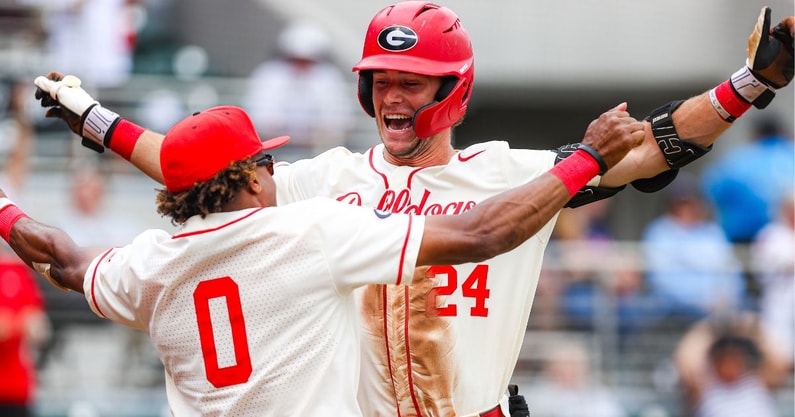 georgia-pitcher-ethan-sutton-wipes-out-while-removing-weather-delay-tarp