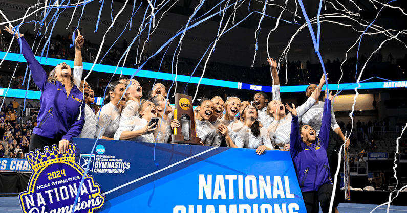 Apr 20, 2024; Fort Worth, TX, USA; The LSU Tigers gymnastics team celebrates after winning the national championship in the 2024 Womens National Gymnastics Championship at Dickies Arena. Mandatory Credit: Jerome Miron-USA TODAY Sports
