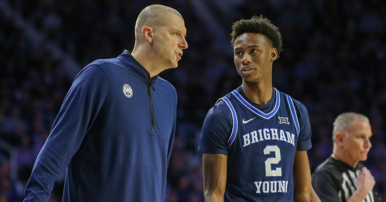 Mark Pope talks to guard Jaxson Robinson during a break in first-half action against the Kansas State Wildcats at Bramlage Coliseum - Scott Sewell-USA TODAY Sports