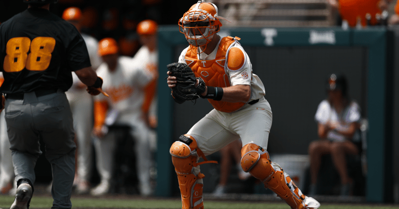 Cal Stark braces for impact at home plate. Credit: UT Athletics