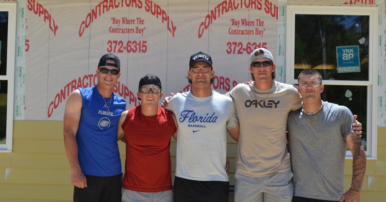 Ty Evans and Florida Gators baseball players volunteering at Habitat for Humanity (Photo courtesy of Florida Victorious / Ty Evans)