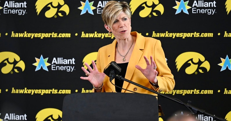 Jan Jensen speaks at her introductory press conference as new head coach of the Iowa Women's Basketball team. (Photo by Dennis Scheidt)