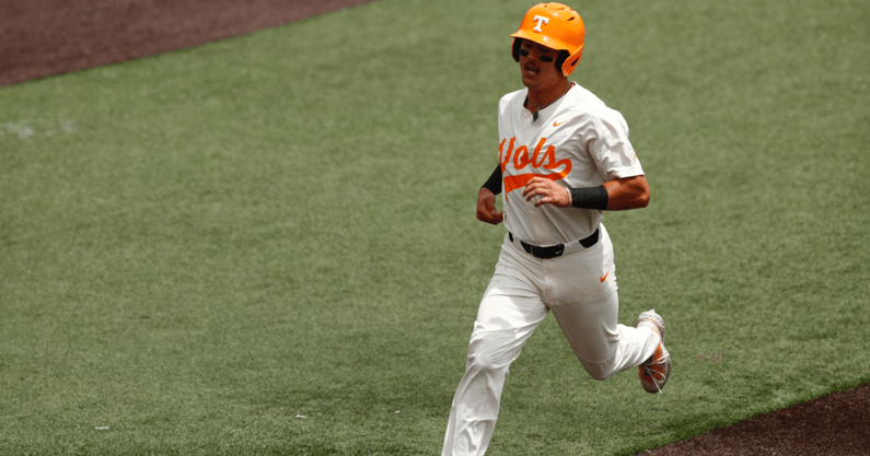 Hunter Ensley runs home for another Tennessee run. Credit: UT Athletics