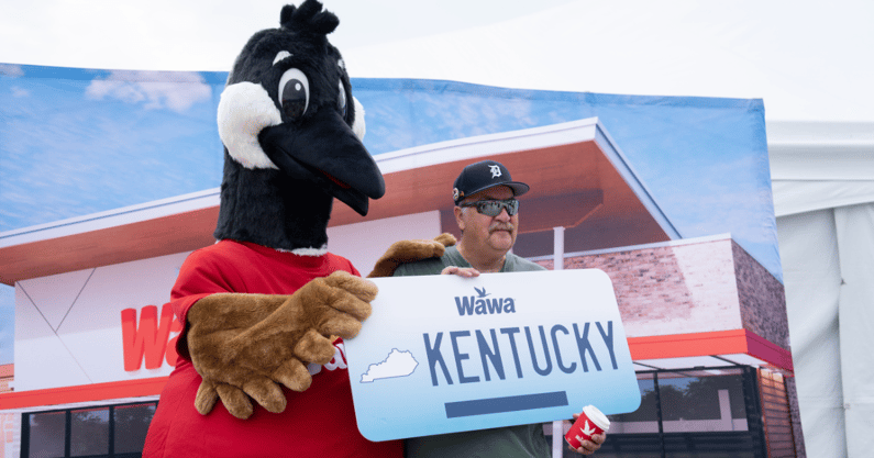 Dennis Hagel poses with the Wawa bird during the groundbreaking for the future Wawa site at Preston Crossing Blvd on Wednesday, June 5, 2024 - © Clare Grant/Courier Journal / USA TODAY NETWORK
