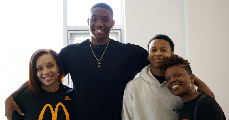 Photo of Brandon Garrison and family by UK Athletics