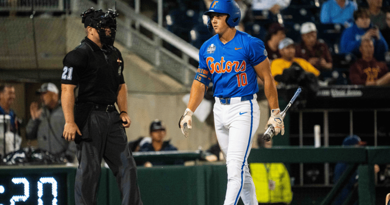 Jun 15, 2024; Omaha, NE, USA; Florida Gators shortstop Colby Shelton (10) strikes out against the Texas A&M Aggies during the fourth inning at Charles Schwab Field Omaha. Mandatory Credit: Dylan Widger-USA TODAY Sports