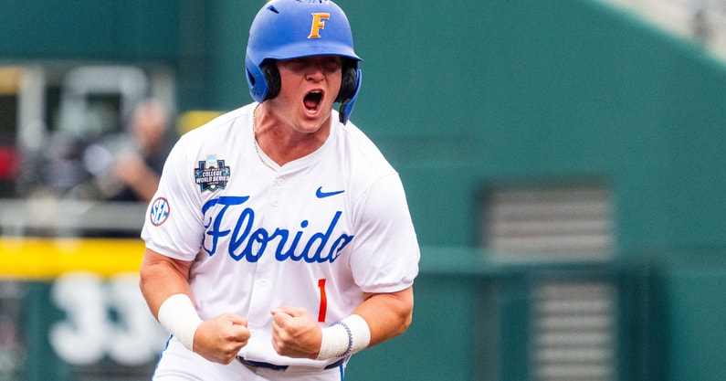 Jun 19, 2024; Omaha, NE, USA; Florida Gators third baseman Dale Thomas (1) celebrates after a grand slam by designated hitter Brody Donay (29) against the Kentucky Wildcats during the first inning at Charles Schwab Field Omaha. Mandatory Credit: Dylan Widger-USA TODAY Sports