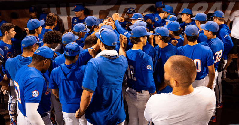 Jun 19, 2024; Omaha, NE, USA; The Florida Gators meet in the dugout after being defeated by the Texas A&M Aggies at Charles Schwab Field Omaha. Mandatory Credit: Dylan Widger-USA TODAY Sports