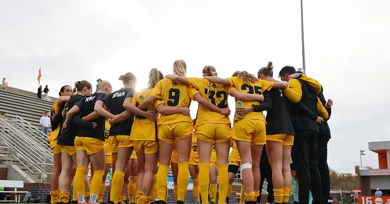 The Hawkeyes huddle before their NCAA Tournament matchup against Georgia. (Photo by Stephen Mally/UI Athletics)