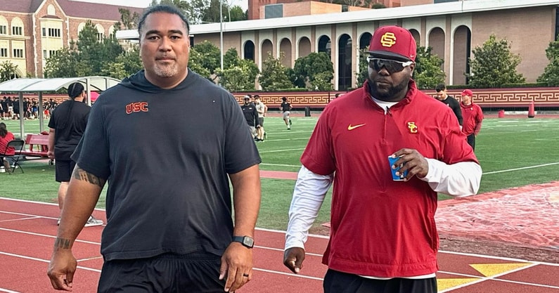 USC Defensive Line coaches Shaun Nua & Eric Henderson.