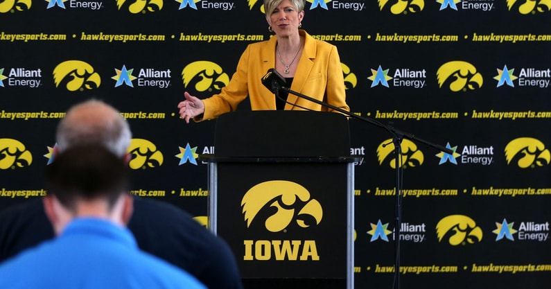 Jan Jensen speaks to media personnel after being named the new Iowa women’s basketball head coach. (Photo by Julia Hansen/Iowa City Press-Citizen)