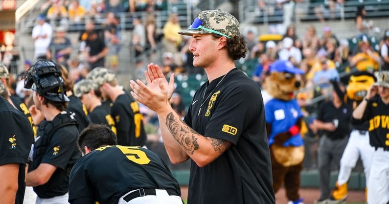 Brody Brecht supports his teammates in a game against Florida International. (Photo by Dennis Scheidt)