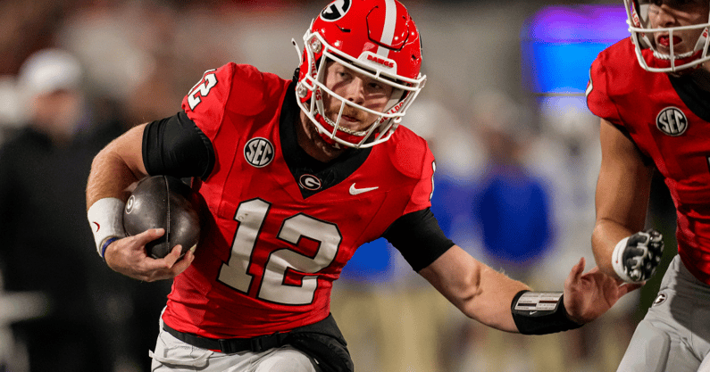 Oct 7, 2023; Athens, Georgia, USA; Georgia Bulldogs quarterback Brock Vandagriff (12) runs against the Kentucky Wildcats during the second half at Sanford Stadium. Mandatory Credit: Dale Zanine-USA TODAY Sports
