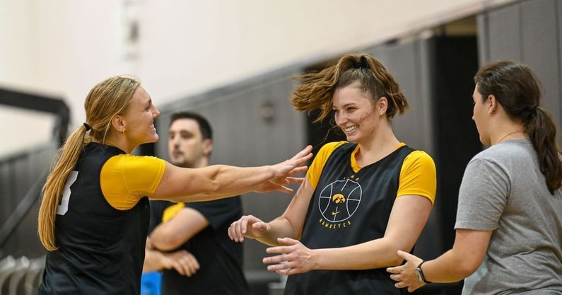 Syd Affolter congratulates her teammate Teagan Mallegni after a made three-pointer. (Photo by Dennis Scheidt)