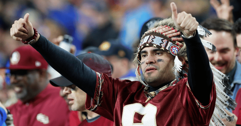 A Florida State Seminoles fan cheers the team against the Pittsburgh Panthers during the third quarter at Acrisure Stadium - Charles LeClaire-USA TODAY Sports