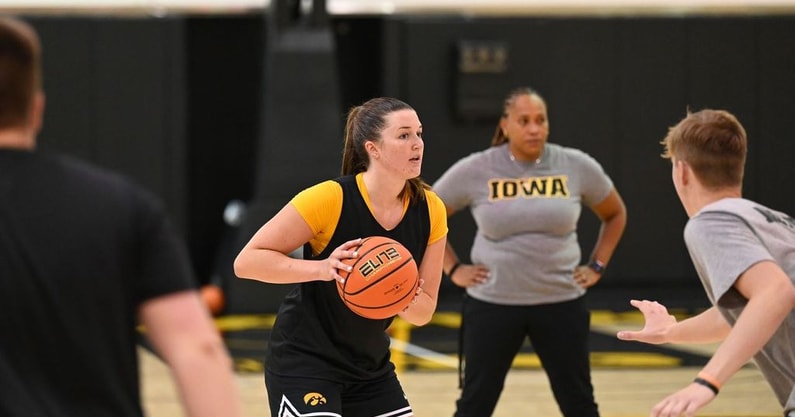 Freshman guard Taylor Stremlow handles the ball during practice on July 11th. (Photo by Dennis Scheidt)
