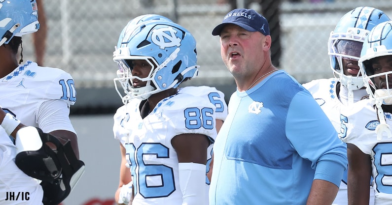 Reciever Madrid Tucker and offensive coordinator Freddie Kitchens in the pregame.
