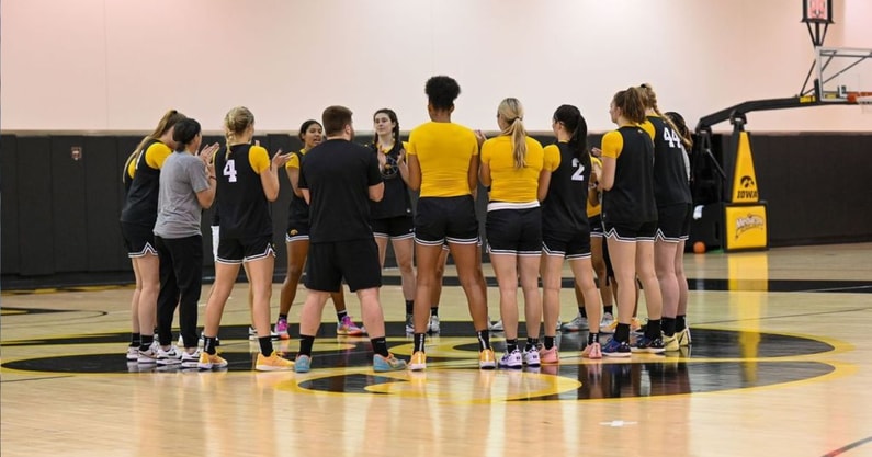 The Iowa Women's Basketball team huddles after practice. (Photo by Dennis Scheidt)