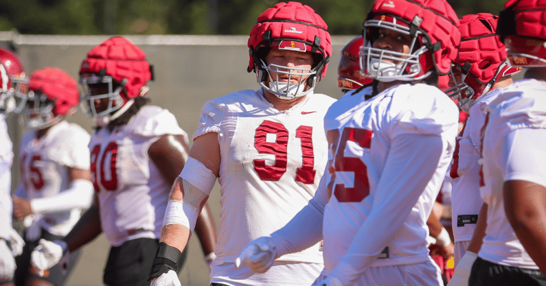 USC defensive lineman Gavin Meyer warms up before a practice with the Trojans
